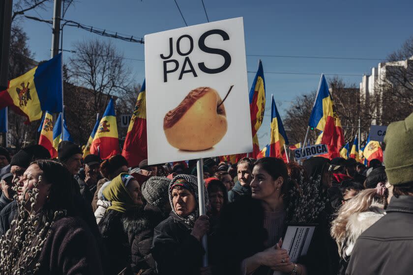 CHISINAU, MOLDOVA - MARCH 12: Thousands of people gather for anti-government protests in Moldova's capital Chisinau amid rising cost-of-living on March 12, 2023. The protest was organized by the populist Sor Party. The protesters marched toward the Grand National Assembly Square. Sporadic clashes broke out from time to time as police tried to stop the march. (Photo by Diego Herrera Carcedo/Anadolu Agency via Getty Images)