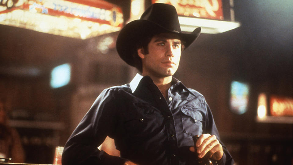 John Travolta in “Urban Cowboy” - Credit: Paramount / Everett Collection