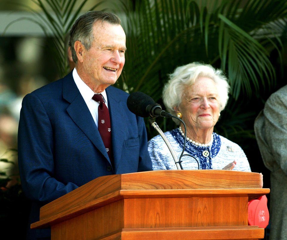 Former President George H.W. Bush and Barbara Bush attend a portrait unveiling at the George Bush Library in College Station, Texas, on April 21, 2003.