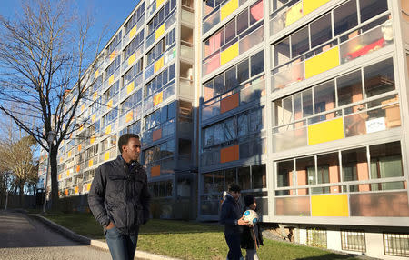 A local socialdemocratic politian Mohamed Nuur walks in the western Stockholm suburb of Rinkeby, Sweden, April 10, 2017. REUTERS/Johan Ahlander