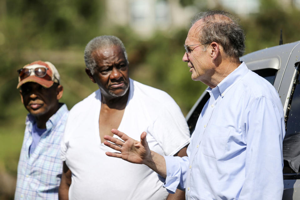 Mississippi Republican Lt. Gov. Delbert Hosemann, right, speaks with Jasper County resident Jessie Crosby as he surveys the damage following an overnight tornado that swept through the small community of Louin, Miss., Monday, June 19, 2023. (James Pugh/impact601.com via AP)