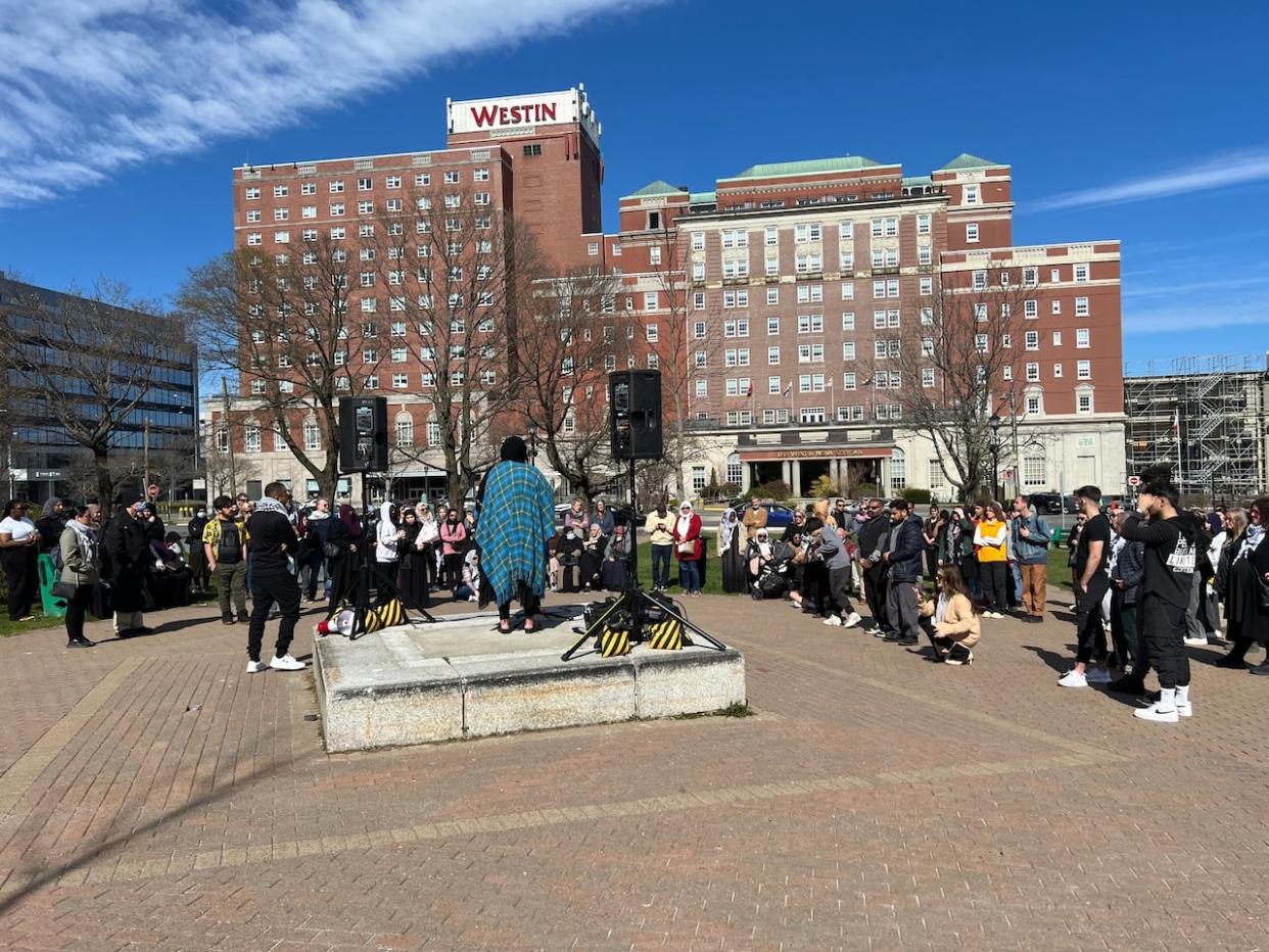 About 100 people gathered in downtown Halifax on Sunday to remember Ahmad Al Marrach. (Vernon Ramesar/CBC - image credit)