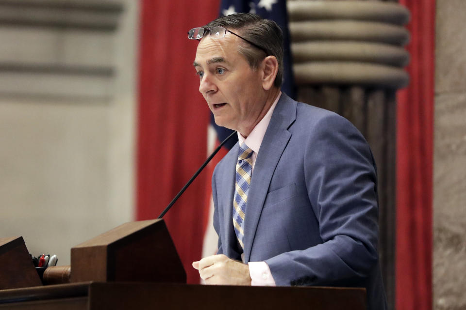 FILE - In this May 1, 2019 file photo, House Speaker Glen Casada, R-Franklin, stands at the microphone during a House session in Nashville, Tenn. Casada announced Tuesday, May 21, 2019 he plans to resign from his leadership post following a vote of no confidence by his Republican caucus amid a scandal over explicit text messages. (AP Photo/Mark Humphrey, file)