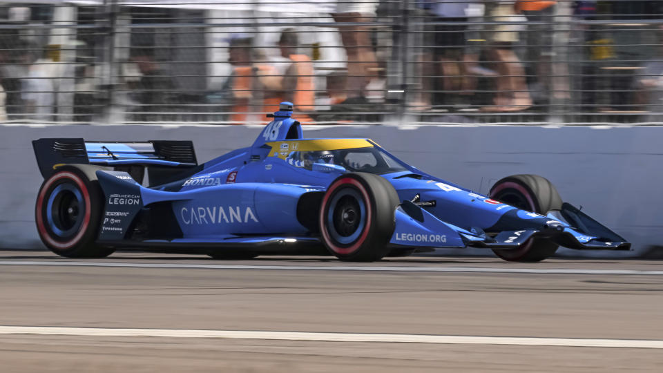 Jimmie Johnson drives the Caravan Chip Ganassi Racing Honda (car 48) during a practice session for the Grand Prix of St. Petersburg, Feb. 26, 2022, in St. Petersburg, Fla. A record seven wins, the most laps led in Texas Motor Speedway history and a resume so stout they renamed victory lane after him. But as Jimmie Johnson prepares for his IndyCar debut at the track he dominated for a decade he has low expectations of earning a trip to “the Jimmie Johnson Winners Circle." Johnson will race Sunday, March 20, 2022 at Texas in his first oval race as an IndyCar driver. (AP Photo/Steve Nesius)