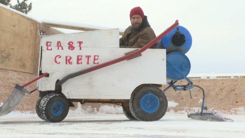 This lawn mower-powered mini-Zamboni is about as Canadian as it gets