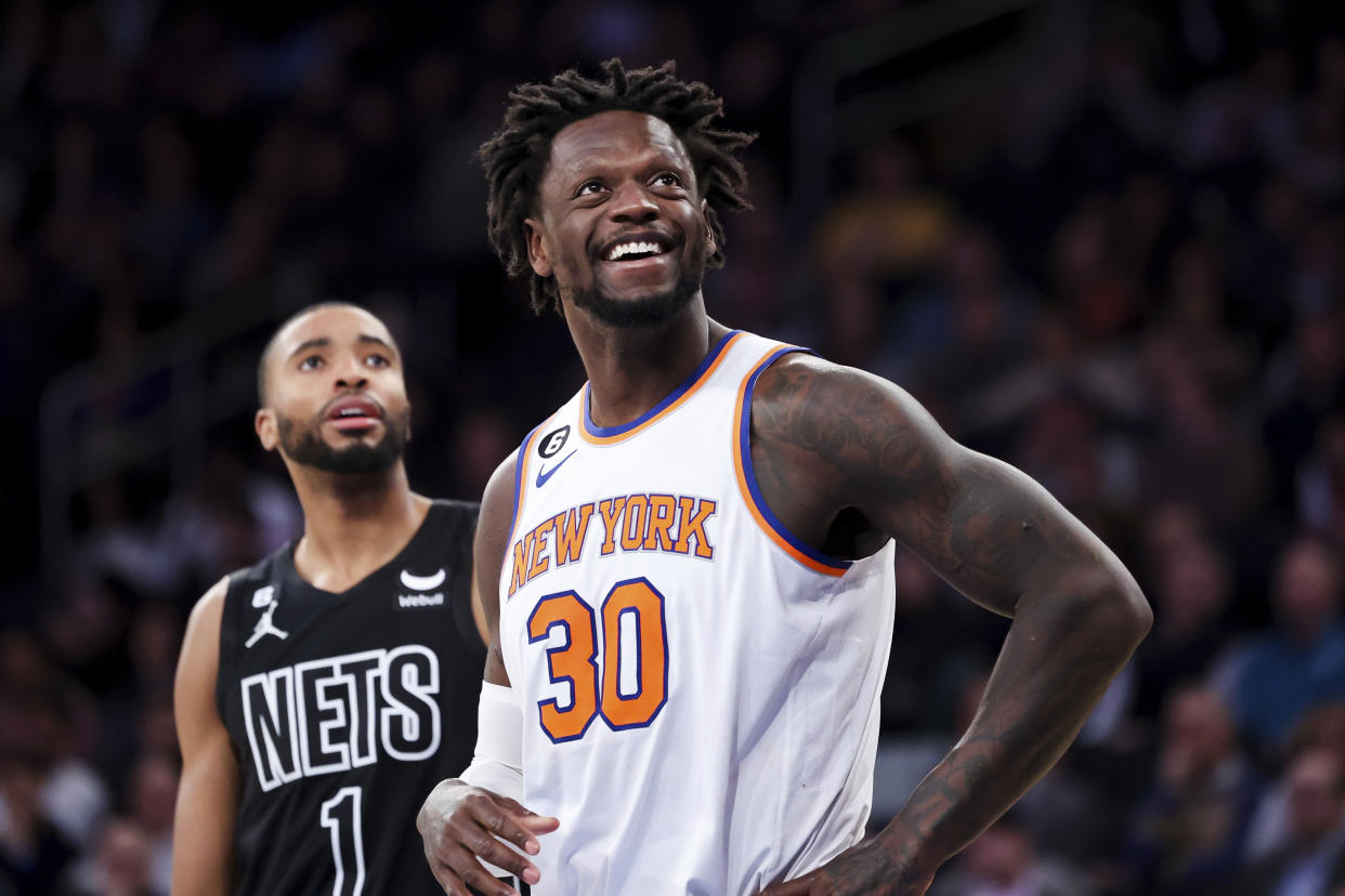 New York Knicks forward Julius Randle (30) reacts during a free throw as Brooklyn Nets forward Mikal Bridges (1) watches the play during the second half of an NBA basketball game, Monday, Feb. 13, 2023, in New York. (AP Photo/Jessie Alcheh)