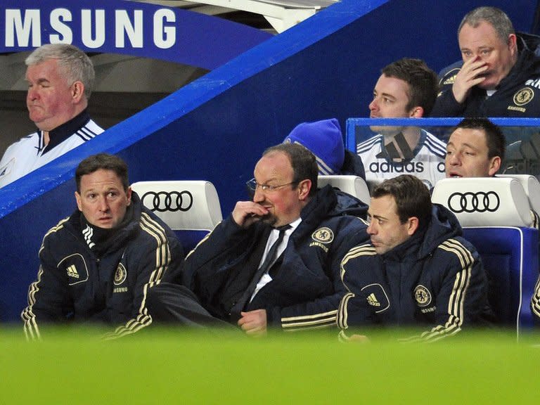 Chelsea's interim manager Rafael Benitez (C) cuts a frustrated figure during his side's 2-2 home draw with Southampton on January 16, 2013. Benitez blamed Chelsea's defensive problems for their failure to beat struggling Southampton and admitted skipper John Terry remains a major doubt for the weekend clash with Arsenal