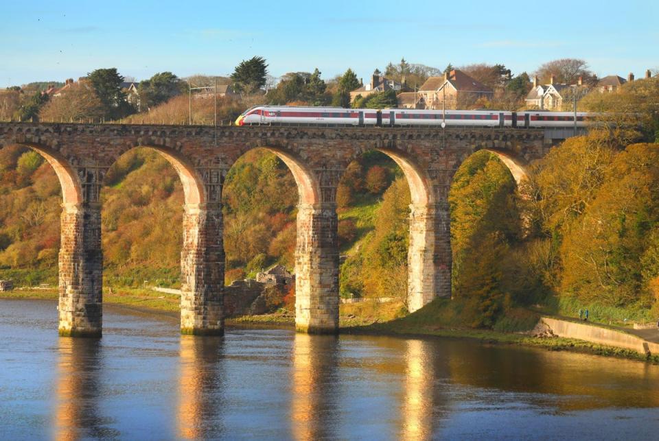 An LNER train crosses the Royal Border Bridge at Berwick-upon-Tweed on the East Coast Main Line (LNER)