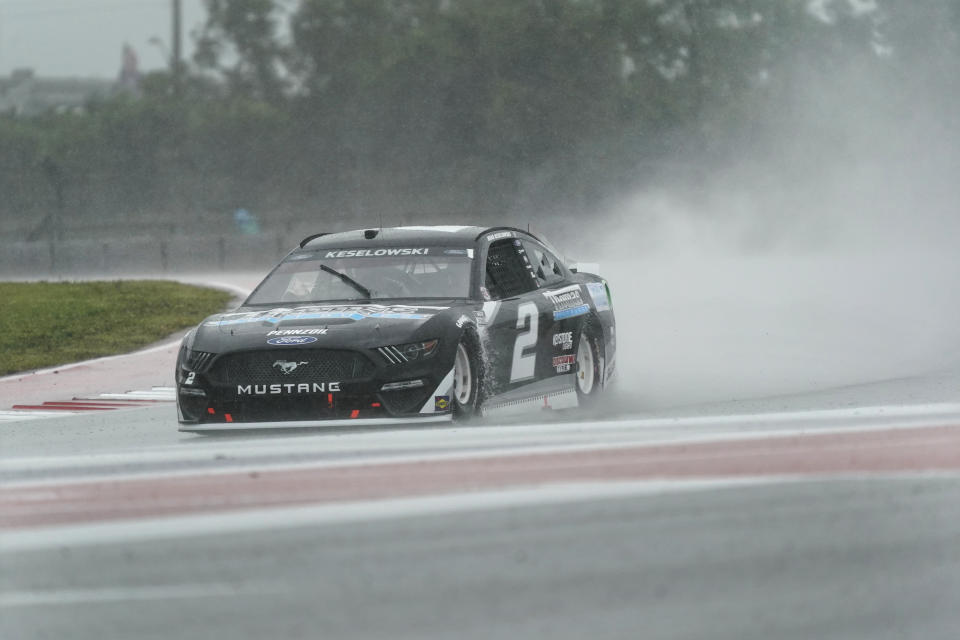 Brad Keselowski (2) drives out of Turn 18 during practice for Sunday's NASCAR Cup Series auto race at the Circuit of the Americas in Austin, Texas, Saturday, May 22, 2021. (AP Photo/Chuck Burton)