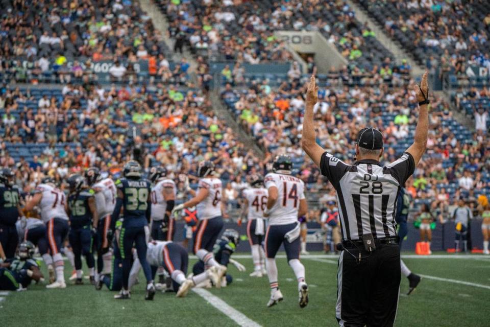 Down judge Mark Hittner confirms the touchdown for the Chicago Bears in the second half of their preseason game against the Seattle Seahawks in Lumen Field on Aug. 18, 2022. Clare Grant/The News Tribune/cgrant@thenewstribune.com