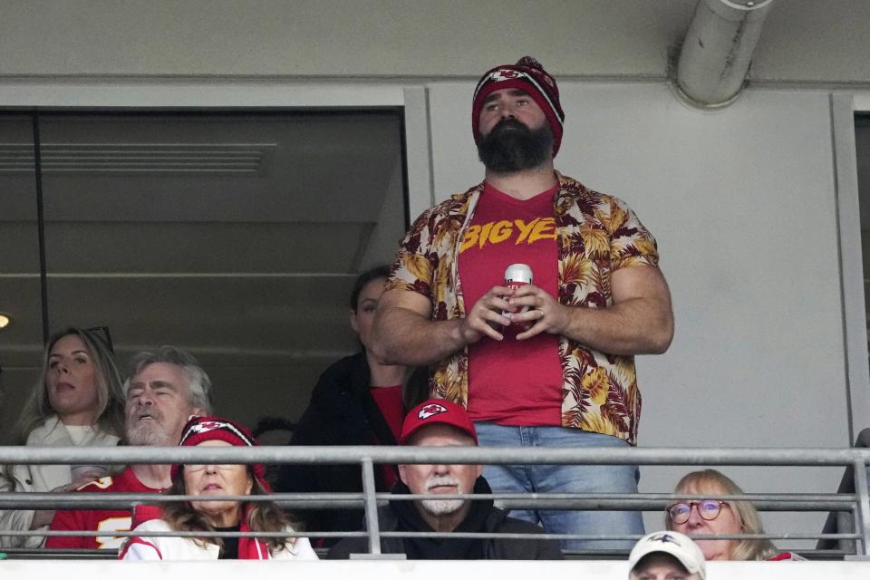 Jason Kelce center, watches action with Donna Kelce, bottom right, and Ed Kelce, left, during the first half of the AFC Championship NFL football game between the Baltimore Ravens and the Kansas City Chiefs, Sunday, Jan. 28, 2024, in Baltimore. (AP Photo/Nick Wass)