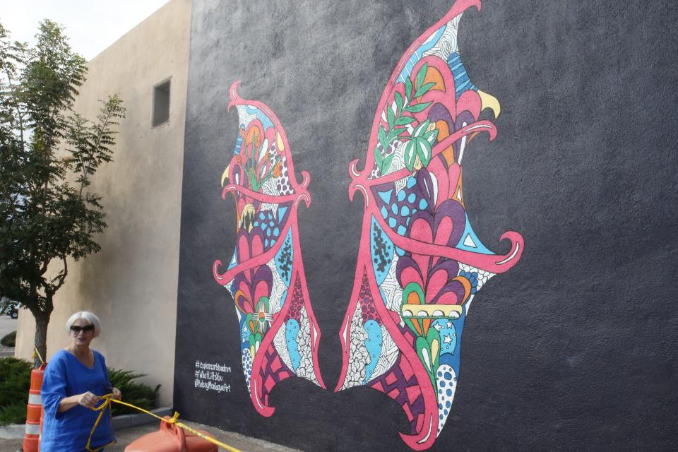 Creative Carlsbad Arts Council President Dianne Joop is pictured at Carlsbad downtown bat wing mural, Oct. 24, 2023 in Carlsbad.