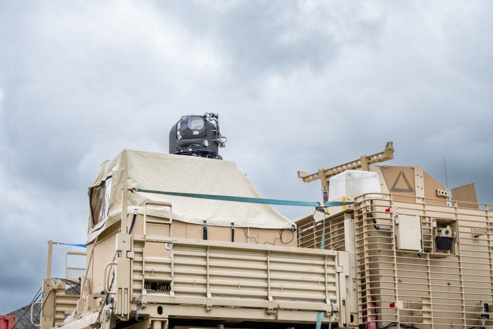 The laser weapon mounted onto a British Army Wolfhound armored vehicle in an undated handout.