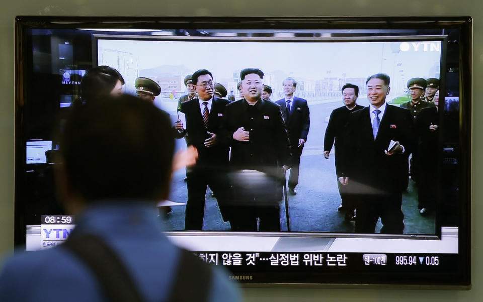 FILE - In this Oct. 14, 2014 file photo, a man watches a TV news program at the Seoul Railway Station in Seoul, South Korea, showing North Korean leader Kim Jong Un using a cane, reportedly during his first public appearance in five weeks in Pyongyang, North Korea. Kim Jong Un’s two-week absence from public view has inspired speculation and rumors, but past disappearances of North Korea's ruling elite frequently have simply shown the disconnect between insatiable curiosity about the country and the secrecy surrounding its leadership. (AP Photo/Lee Jin-man, File)