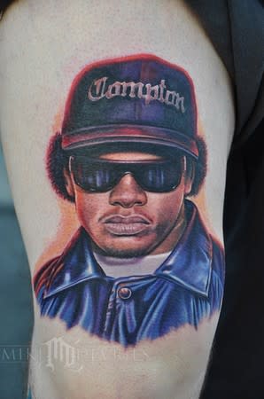 <div class="caption-credit"> Photo by: Mike Devries/mdtattoos.com</div>Eazy-E: the leg tribute.