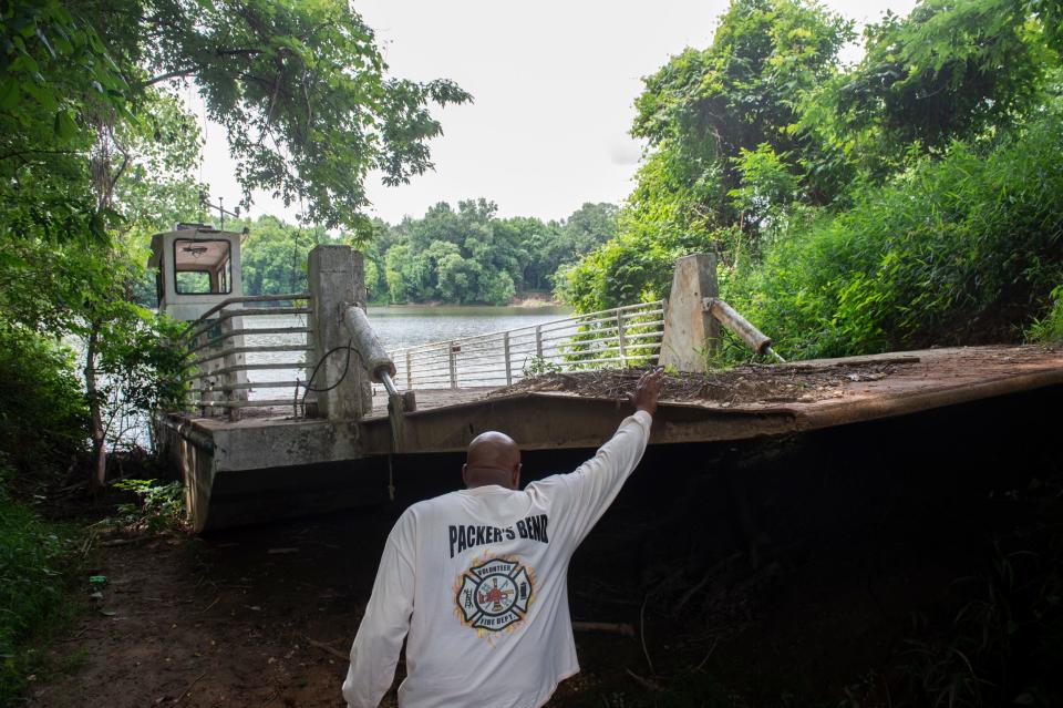 Resident Gerald Huff checks out the old ferry on the Alabama River in Franklin. Huff's grandfather and great-grandfather both operated the ferry in the past.