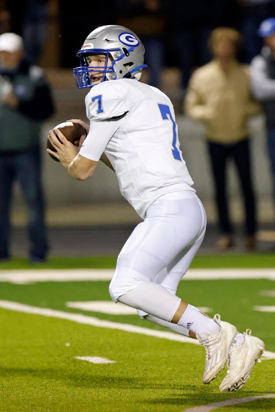 Guthrie quarterback Hayden Calvert (7) passes during a high school football game between Guthrie and Del City in the quarterfinals of the Class 5A playoffs in Del City, Okla., Friday, Nov. 17, 2023.