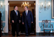 U.S. Secretary of State Mike Pompeo and Georgia's Prime Minister Giorgi Kvirikashvili walk in to deliver remarks together at their Georgia Strategic Partnership meeting at the State Department in Washington, U.S., May 21, 2018. REUTERS/Leah Millis