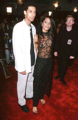 Aaliyah with a man in tow at the Westwood premiere of Warner Brothers' Romeo Must Die