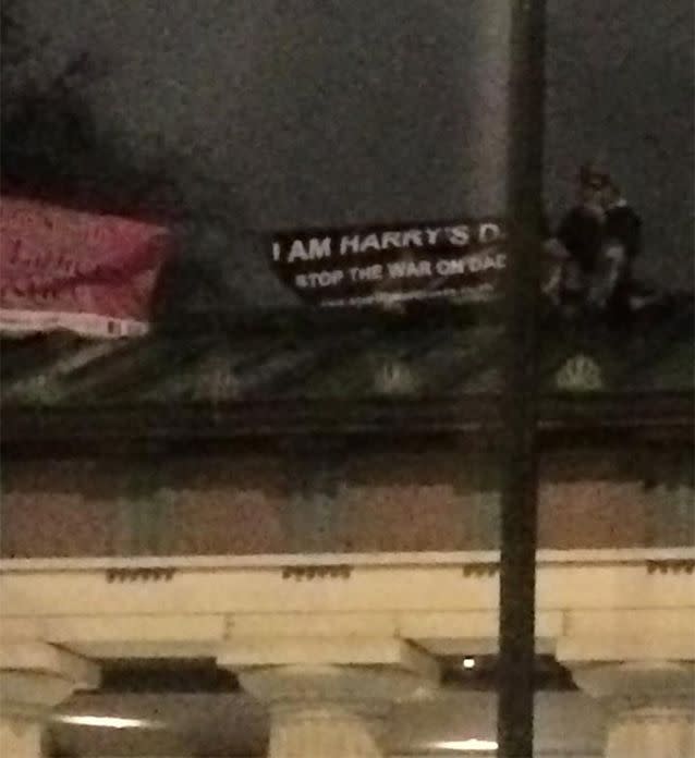 The activists climbed onto the roof and hold a banner reading 