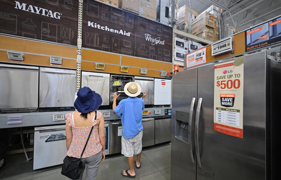 People shop for home appliances on September 12, 2023 in Monterey Park, California.  (Photo by FREDERIC J. BROWN/AFP via Getty Images)