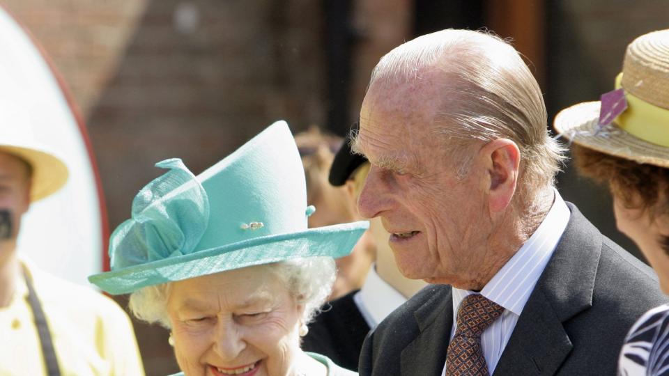 Queen Elizabeth II looks on as HRH Prince Philip