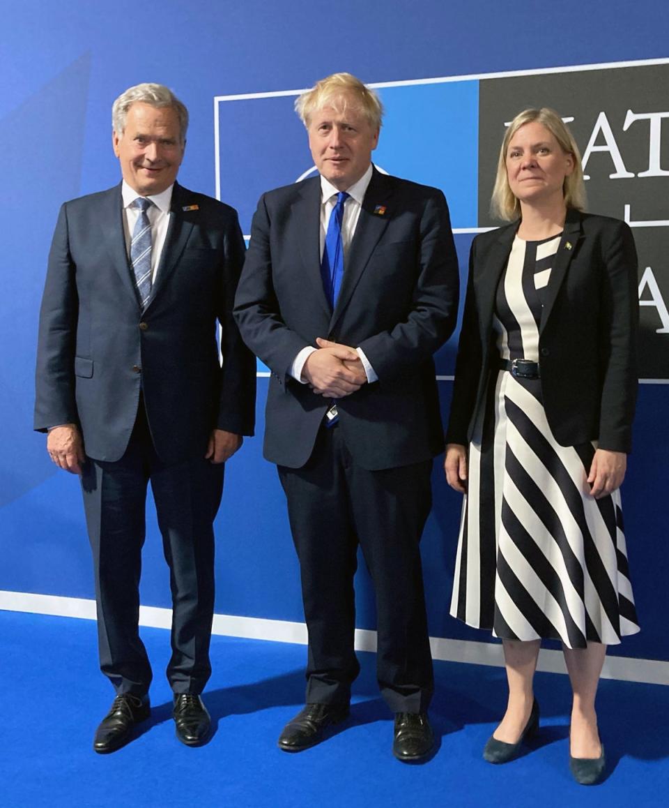 Boris Johnson greets Swedish Prime Minister Magdalena Andersson (right) and Finnish President Sauli Niinisto (PA)