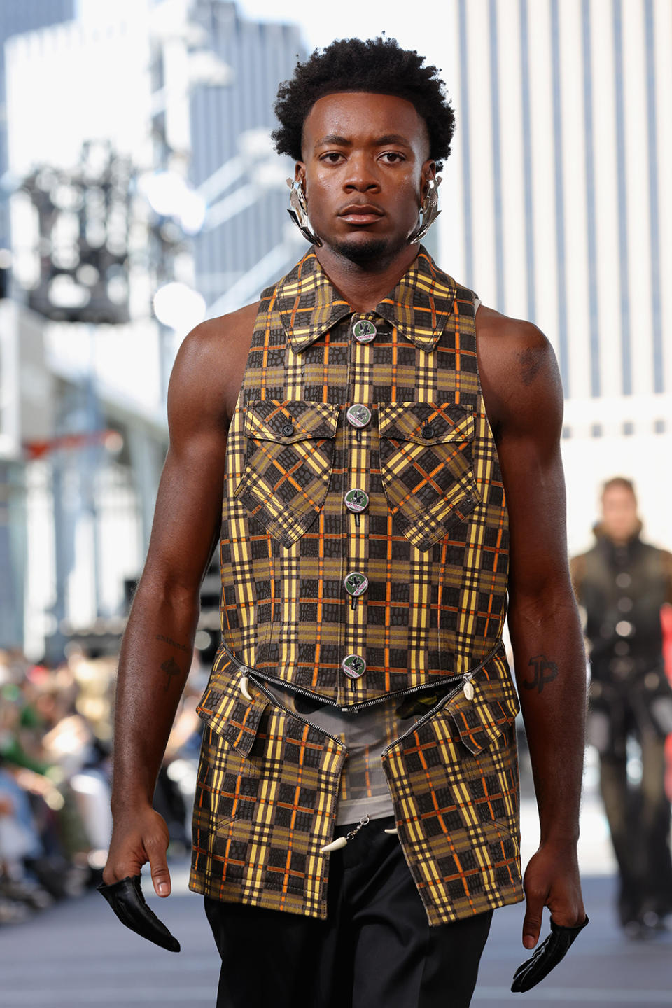 David Banda walks the runway at Off-White's spring 2025 fashion show as part of New York Fashion Week on Sept. 8, Madonna