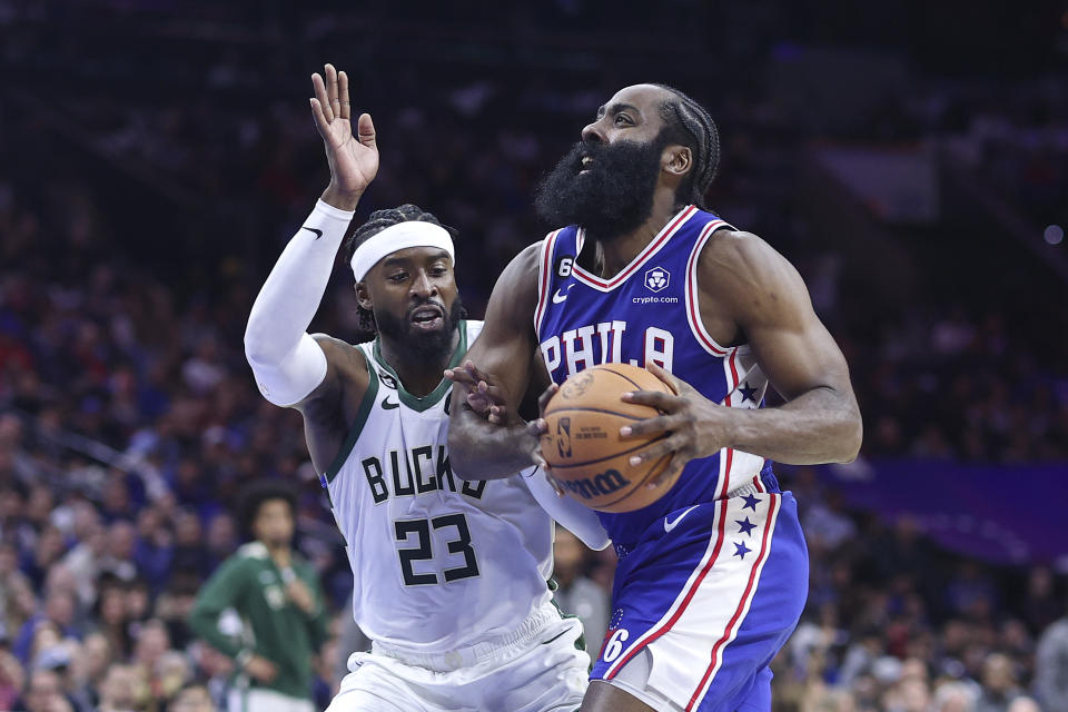 Pictured right, Not even a game-high 31 points from James Harden drives to the basket for Philadelphia against the Milwaukee Bucks.