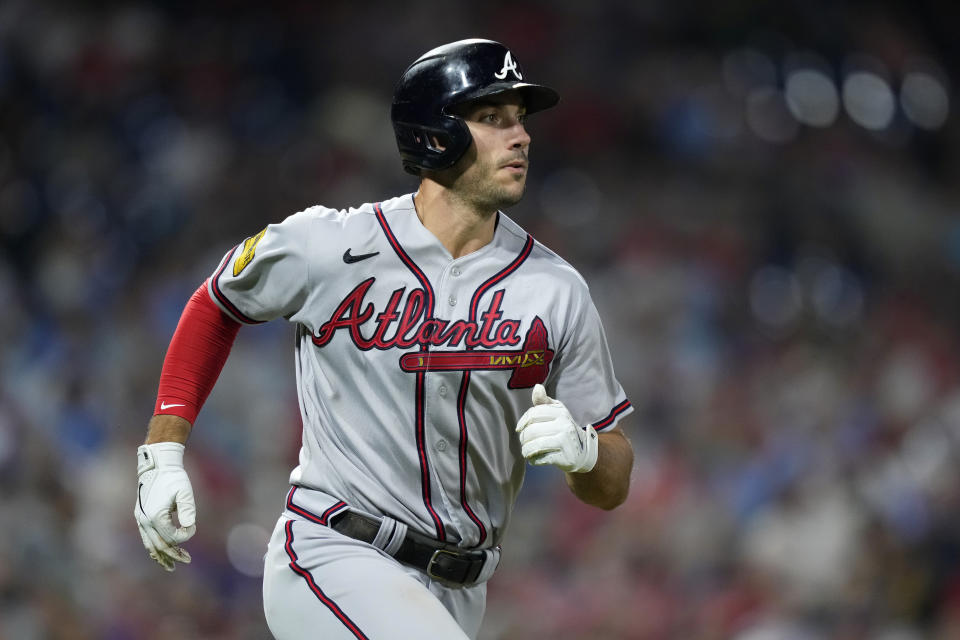 Atlanta Braves' Matt Olson runs after hitting a single against Philadelphia Phillies pitcher Seranthony Dominguez during the seventh inning of a baseball game, Tuesday, Sept. 12, 2023, in Philadelphia. (AP Photo/Matt Slocum)