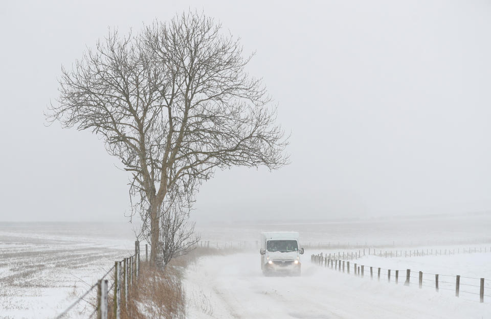 A van makes it’s way through the snow on the B3081 near to Shaftesbury in Dorset, Snowfall and icy conditions are expected to cause widespread travel disruption after temperatures plummeted as low as minus 15.4C (4.3F) overnight. (Photo by Andrew Matthews/PA Images via Getty Images)