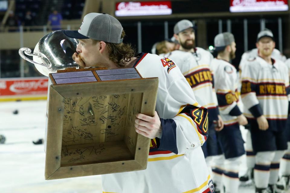 Peoria Rivermen center JM Piotrowski kisses the President's Cup after his game-winner in overtime delivered the SPHL Finals to Peoria in Game 4 over Roanoke at Berglund Center on May 3, 2022.