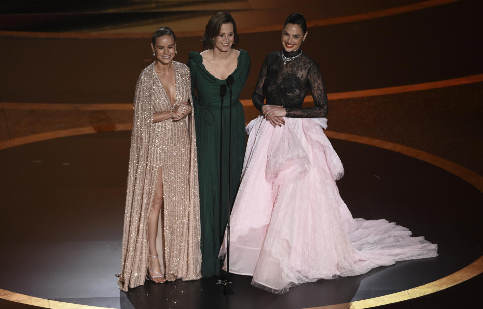 Brie Larson, from left, Sigourney Weaver and Gal Gadot introduce a performance by maestro Eimear Noone at the Oscars on Sunday, Feb. 9, 2020, at the Dolby Theatre in Los Angeles. (AP Photo/Chris Pizzello)