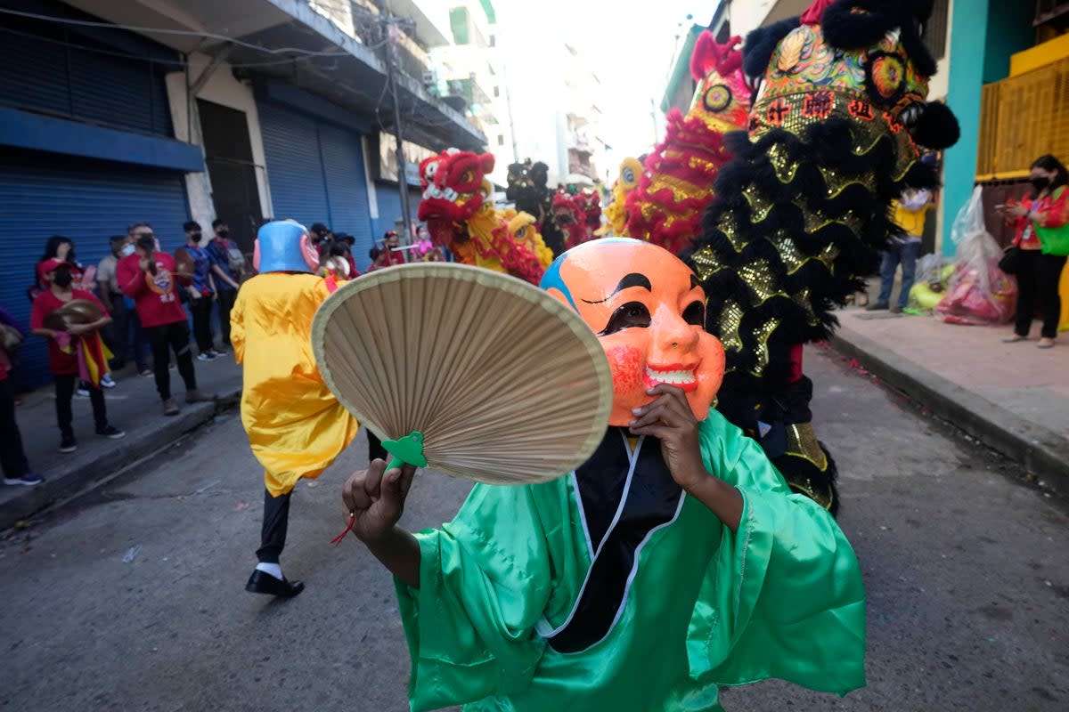 Chinese New Year sees London come alive with a large parade, food, music, and performances   (Arnulfo Franco / AP)