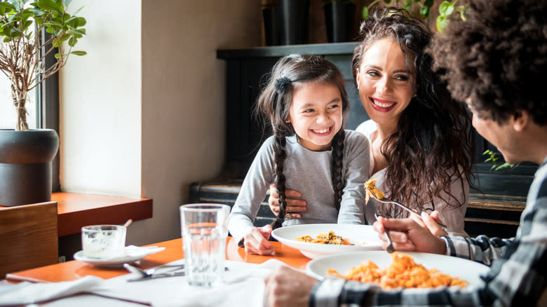 family eating at Italian restaurant