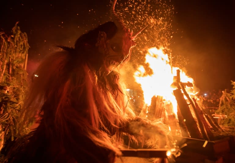 "Krampuslauf" parades are a booming trade in Austria where the thrill of danger is part of the fun