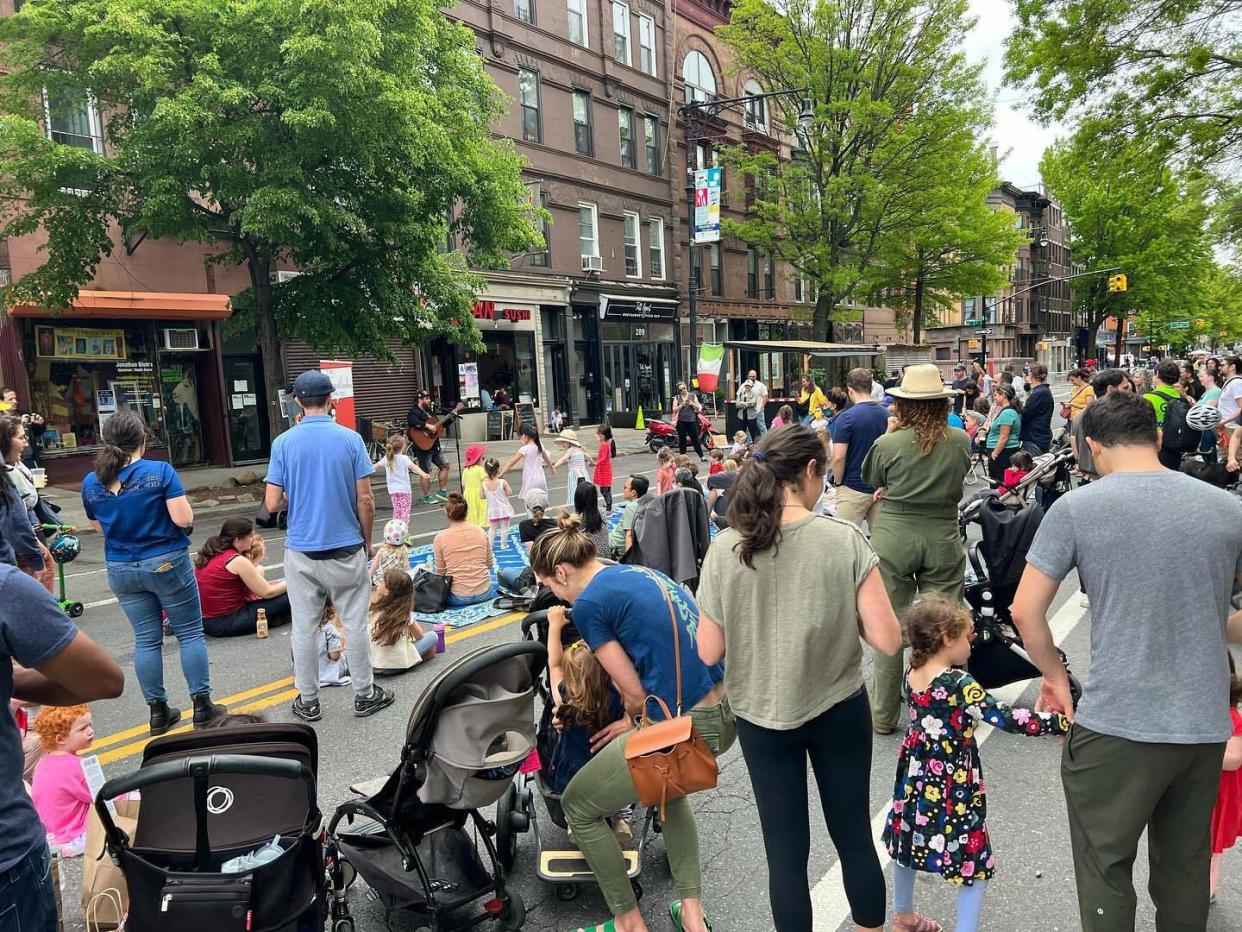 Pedestrians enjoy Park Slope's Open Streets program.