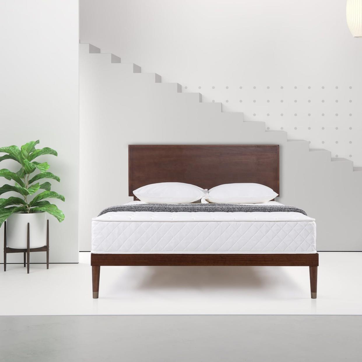 <p><a href="https://go.redirectingat.com?id=74968X1596630&url=https%3A%2F%2Fwww.walmart.com%2Fip%2FZinus-8-Quilted-Hybrid-Mattress-of-Comfort-Foam-and-Pocket-Spring-Full%2F2029745219&sref=https%3A%2F%2F" rel="nofollow noopener" target="_blank" data-ylk="slk:Shop Now;elm:context_link;itc:0;sec:content-canvas" class="link rapid-noclick-resp">Shop Now</a></p><p>Zinus 8 Quilted Hybrid Mattress </p><p>walmart.com</p><p>$158.00</p>