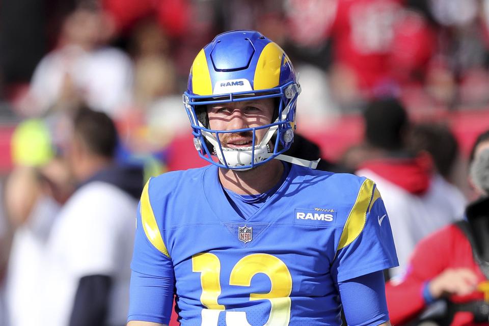 Los Angeles Rams quarterback and Bishop Kenny High product John Wolford (13), seen here walking onto the field prior to an NFC divisional playoff game against the Tampa Bay Buccaneers, will serve as the backup to Matthew Stafford in Super Bowl LVI against the Cincinnati Bengals.