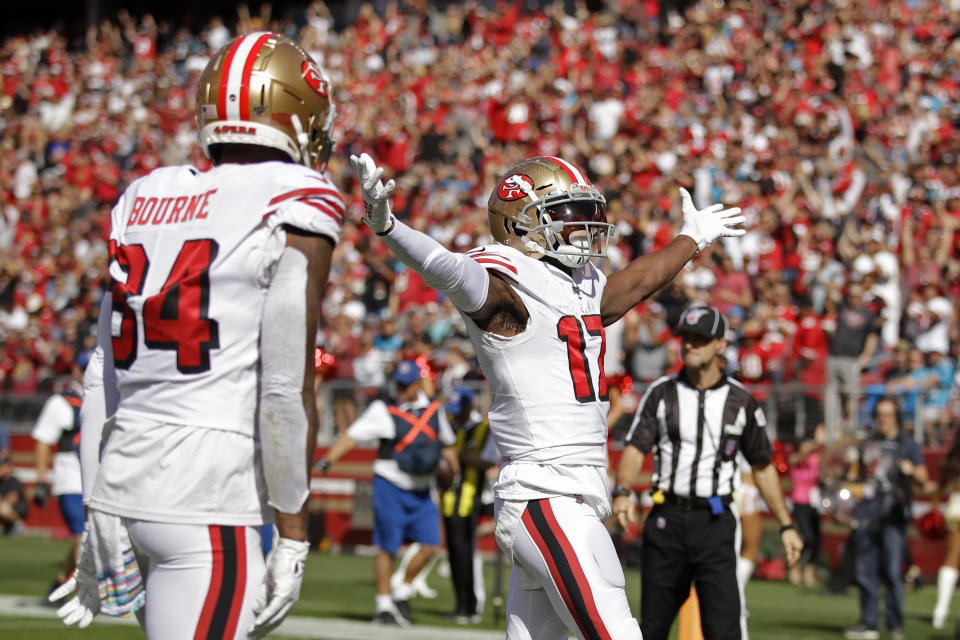 San Francisco 49ers wide receiver Emmanuel Sanders celebrates after scoring a touchdown as wide receiver Kendrick Bourne looks on during the first half of an NFL football game against the Carolina Panthers in Santa Clara, Calif., Sunday, Oct. 27, 2019. (AP Photo/Ben Margot)