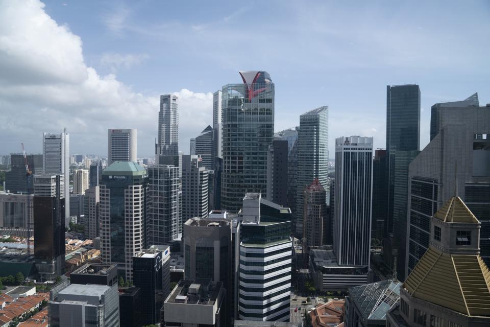 Capitaland Ltd.'s CapitaGreen building, center, stands next to commercial and residential buildings in the central business district (CBD) in Singapore, on Wednesday, Jan. 23, 2019. Photographer: Wei Leng Tay/Bloomberg