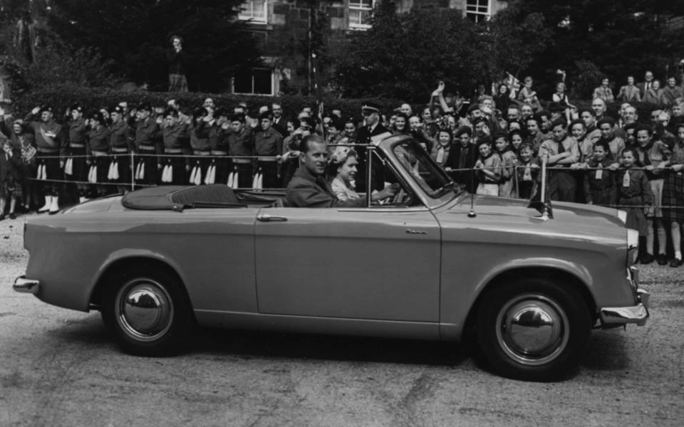 The Duke and the Queen in a Hillman Minx Convertible LDM 114 during a tour of Scotland in 1956 - Getty 