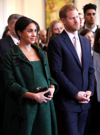 FILE PHOTO: Britain's Prince Harry and Meghan, Duchess of Sussex attend a Commonwealth Day youth event at Canada House in London, Britain, March 11, 2019. Chris Jackson/Pool via REUTERS/File Photo