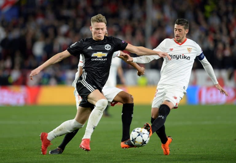 Scott McTominay (left) in action for Manchester United in Wednesday's Champions League clash with Sevilla