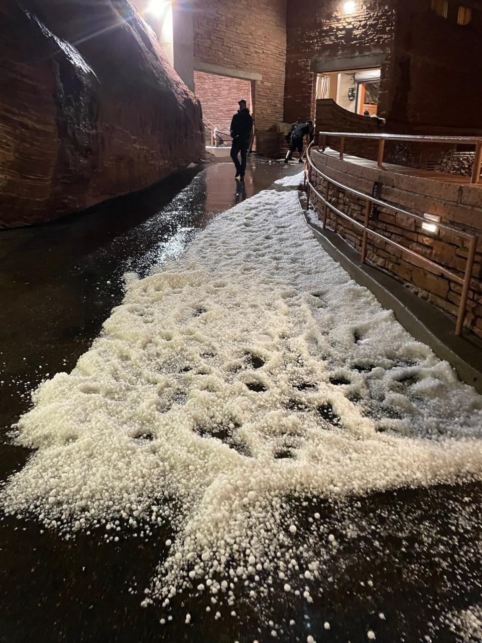 West Metro Fire Rescue said seven people were transported to hospitals with non-life threatening injuries after hail fell on Red Rocks Amphitheater Wednesday night.