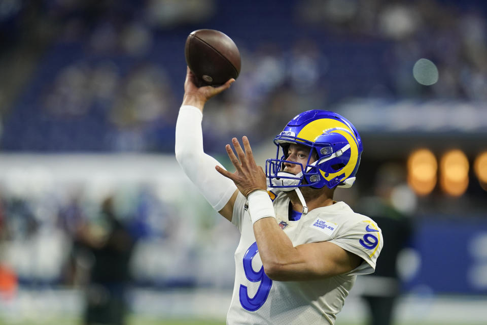 Los Angeles Rams quarterback Matthew Stafford (9) throws before an NFL football game between the Indianapolis Colts and the Los Angeles Rams, Sunday, Sept. 19, 2021, in Indianapolis. (AP Photo/Michael Conroy)