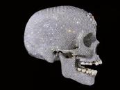 "For the love of God," a life size cast of a human skull in platinum by British artist Damien Hirst is seen in this handout image released in London June 1, 2007. The Skull is covered by 8,601 pave-set diamonds weighing 1,106.18 carats.