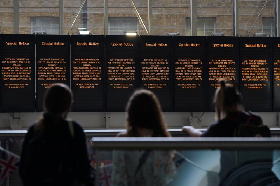 Passengers at King’s Cross station in London following train cancellations (Yui Mok/PA) (PA Wire)