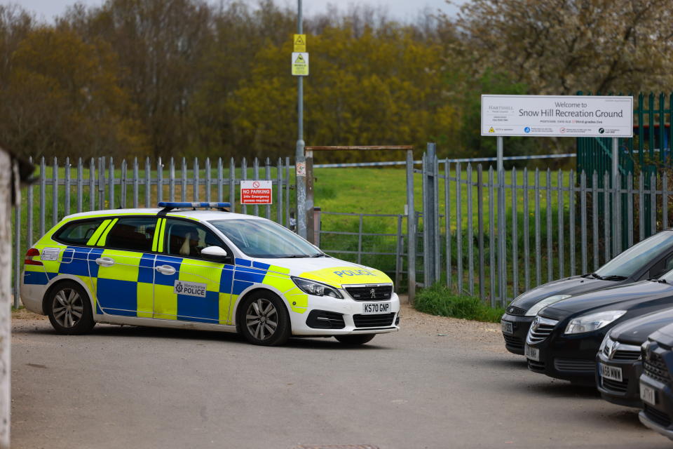 Officers remain at the scene of an altercation at Snow Hill Recreation Ground, which has been sealed off with police tape. (Reach)