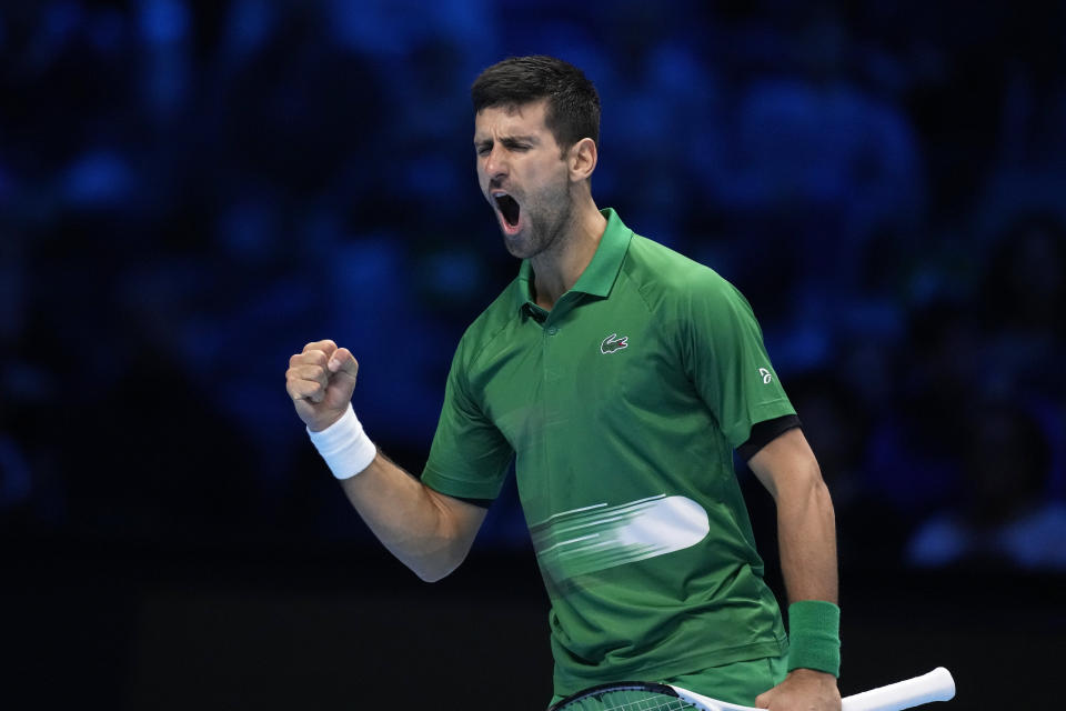 Serbia's Novak Djokovic reacts after scoring a point against Norway's Casper Ruud during their singles final tennis match of the ATP World Tour Finals at the Pala Alpitour, in Turin, Italy, Sunday, Nov. 20, 2022. (AP Photo/Antonio Calanni)